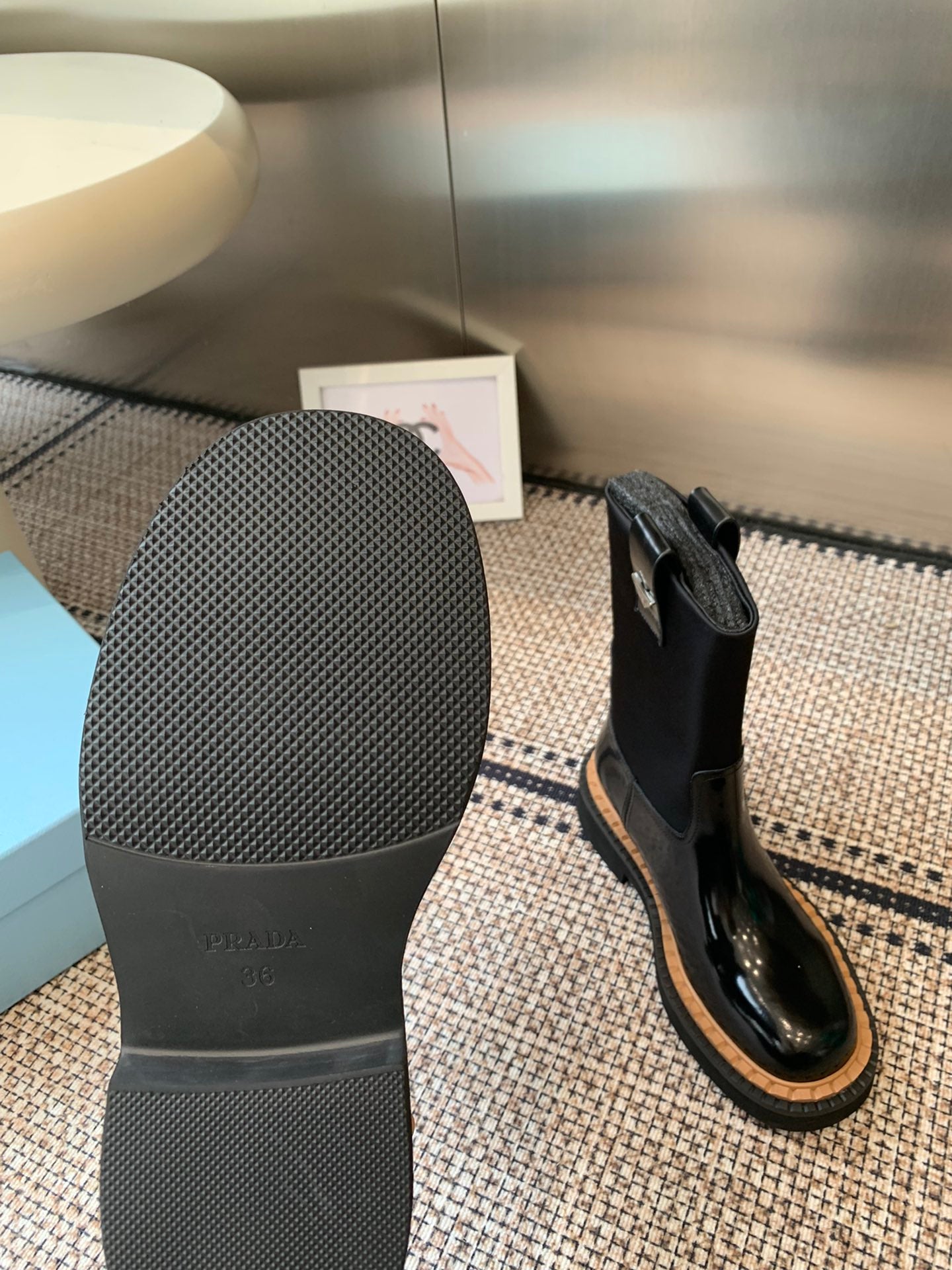 Pra 25fw Classic triangle-shaped ankle boots