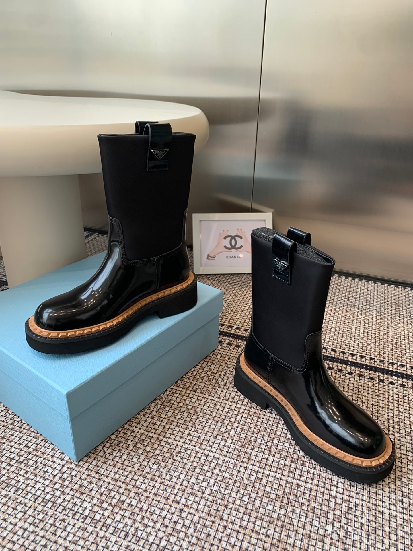 Pra 25fw Classic triangle-shaped ankle boots