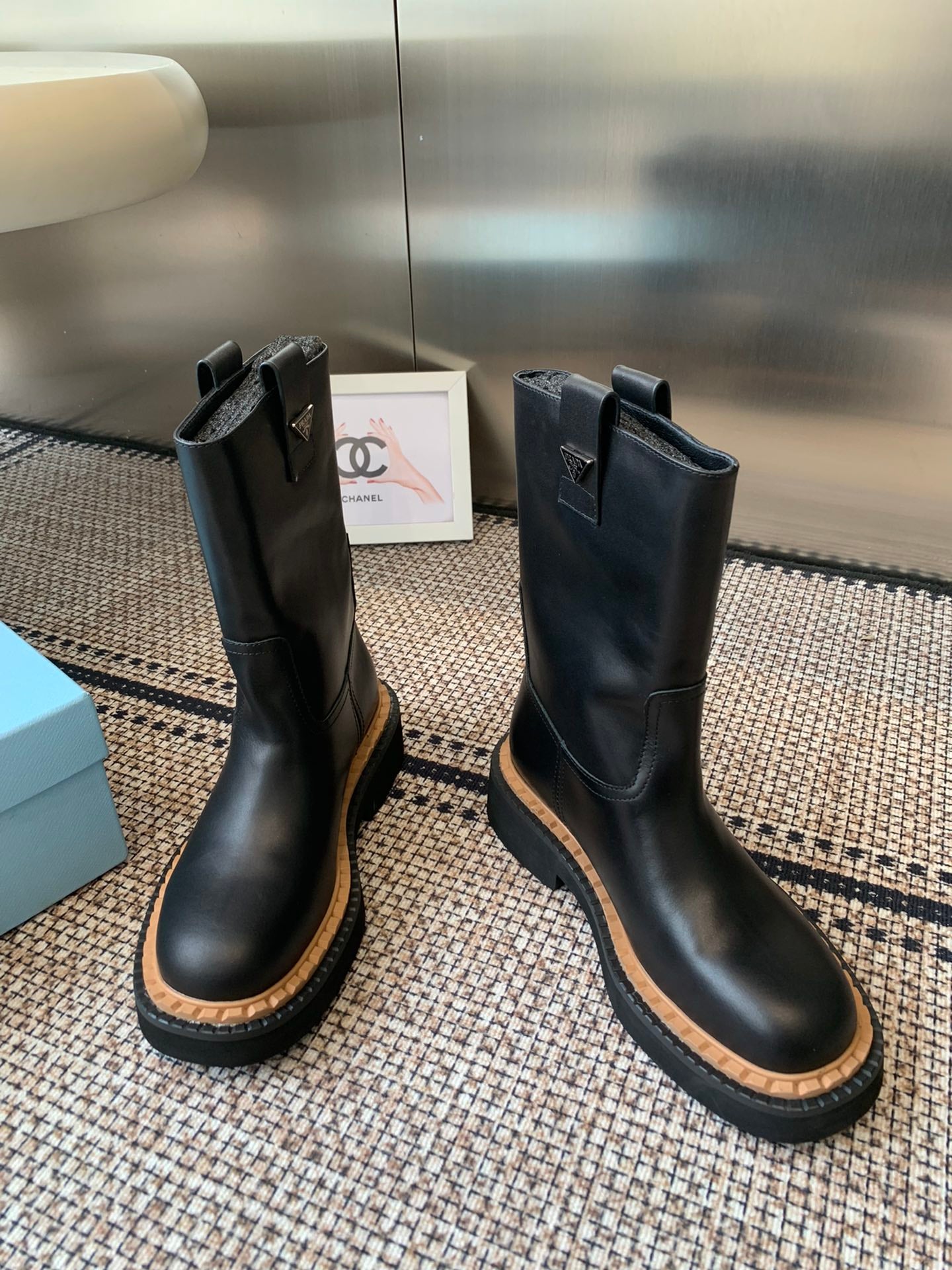 Pra 25fw Classic triangle-shaped ankle boots