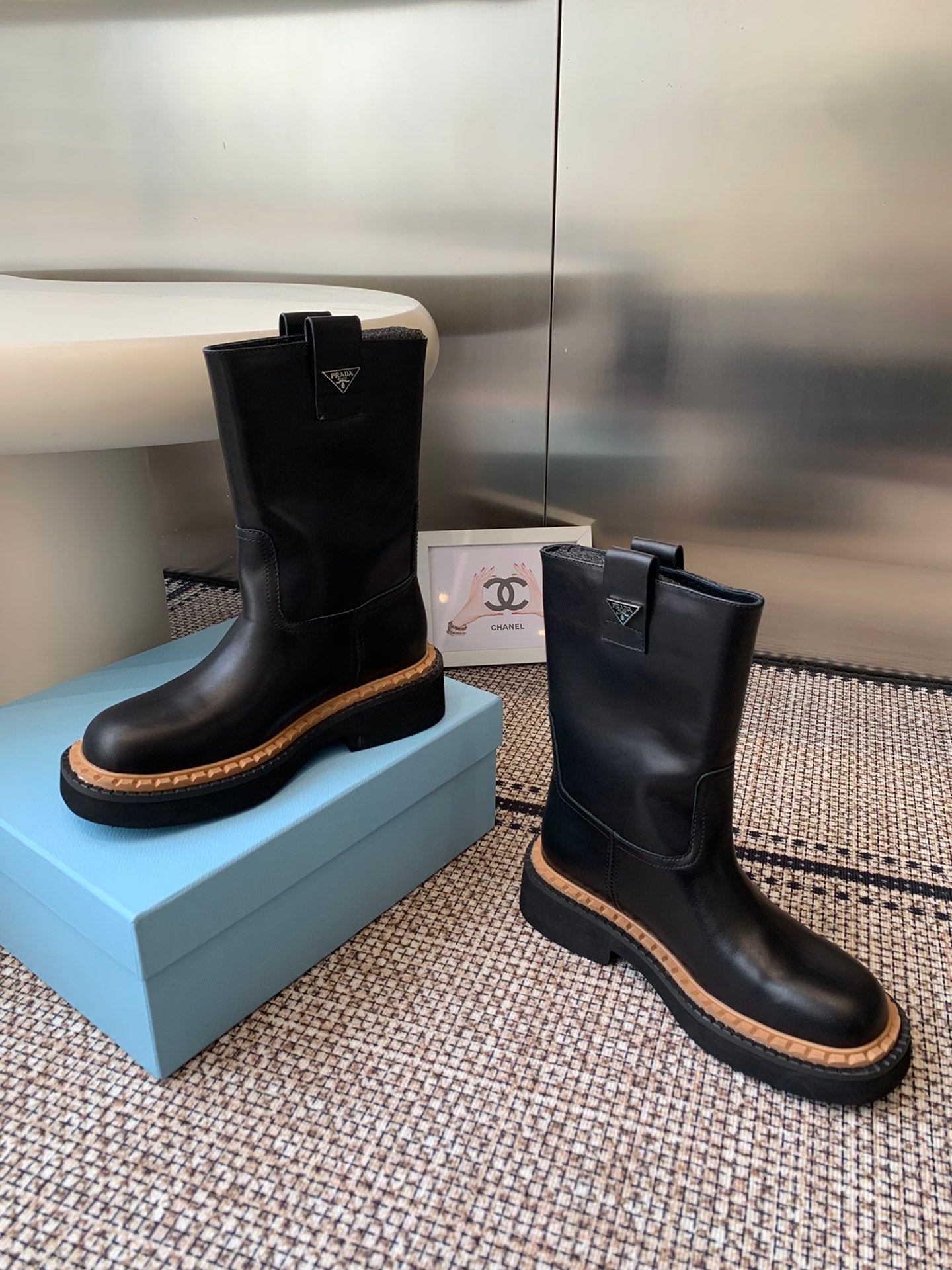 Pra 25fw Classic triangle-shaped ankle boots
