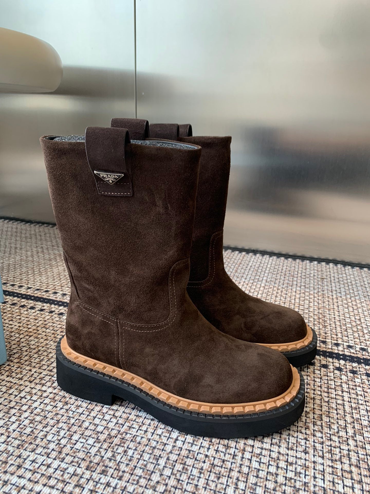 Pra 25fw Classic triangle-shaped ankle boots