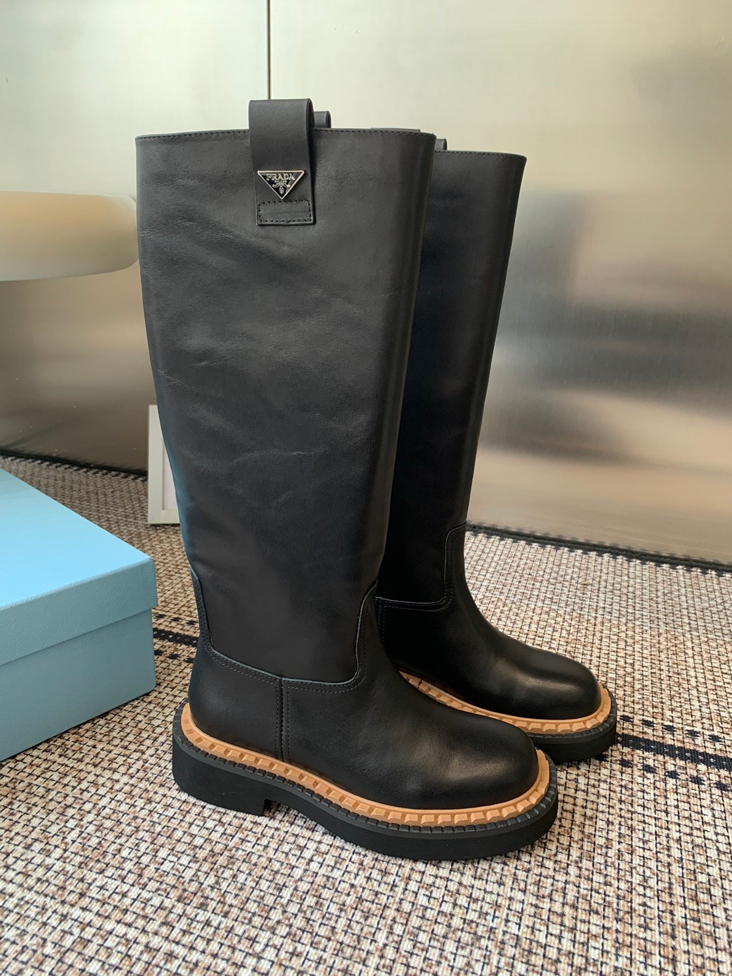 Pra 25fw Classic triangle-studded boots
