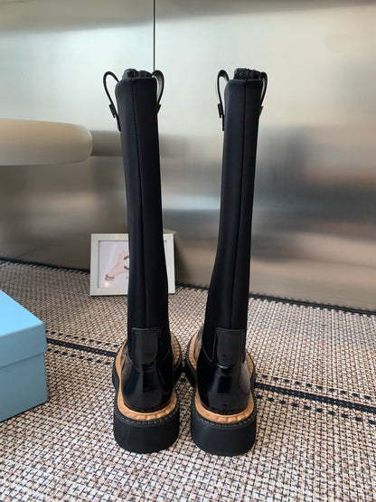 Pra 25fw Classic triangle-studded boots