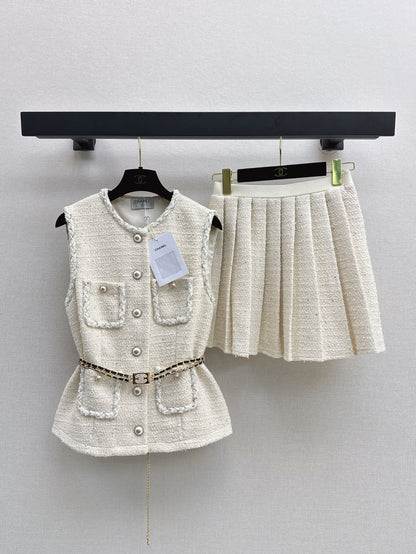 C 25 Sleeveless woven vest + pleated skirt