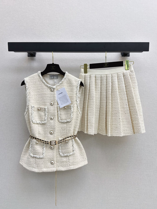 C 25 Sleeveless woven vest + pleated skirt