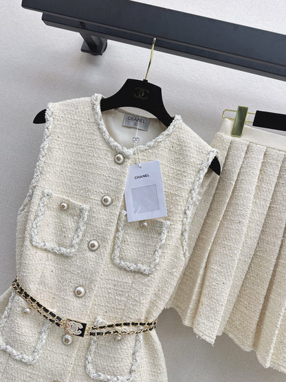 C 25 Sleeveless woven vest + pleated skirt