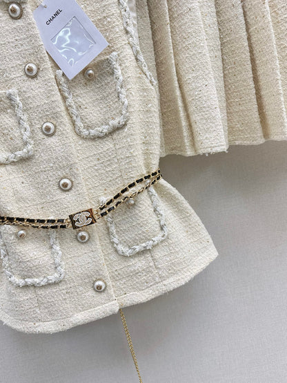C 25 Sleeveless woven vest + pleated skirt