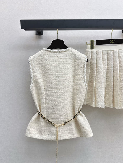 C 25 Sleeveless woven vest + pleated skirt