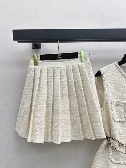 C 25 Sleeveless woven vest + pleated skirt