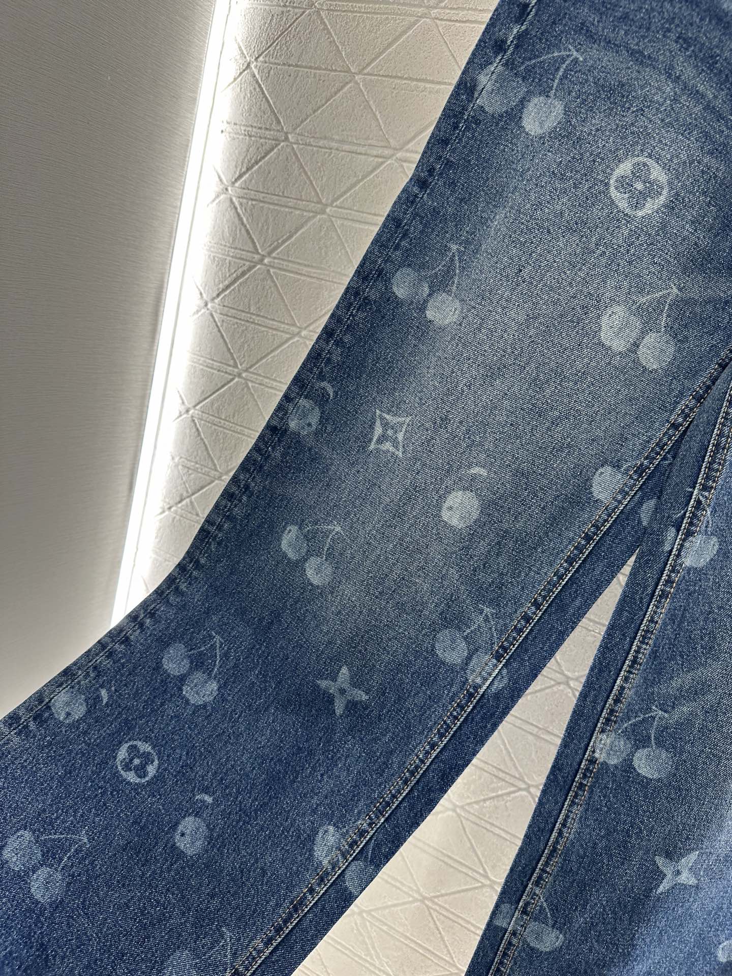 L 25 Straight-leg cherry laser denim trousers