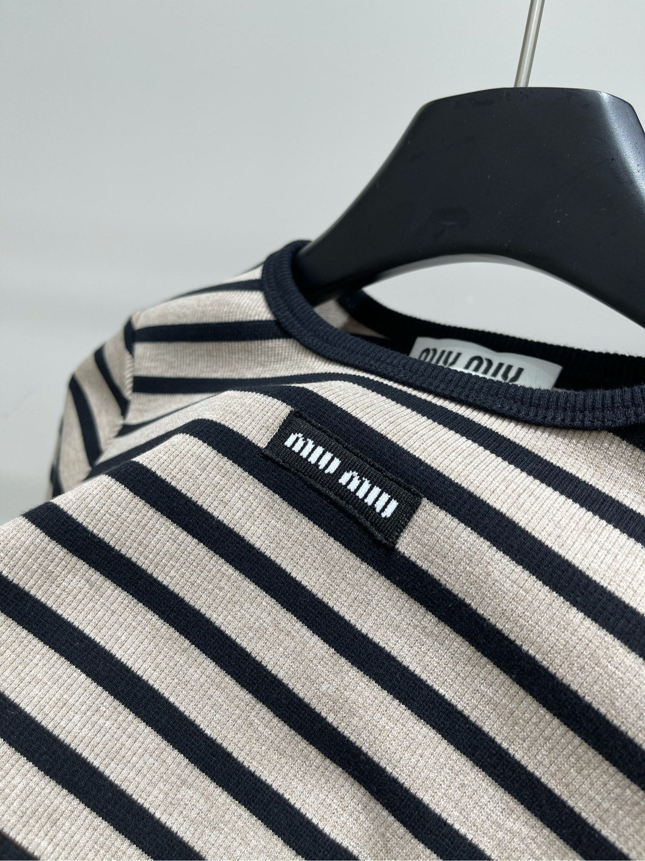 M 25 Beige and black striped round neck three-quarter sleeve top