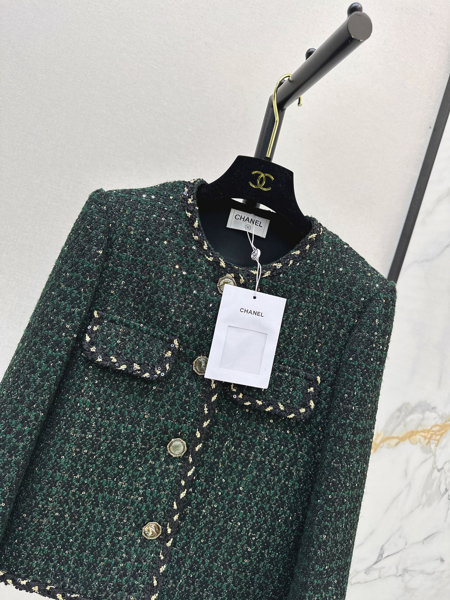 C 25 Trimmed tweed jacket