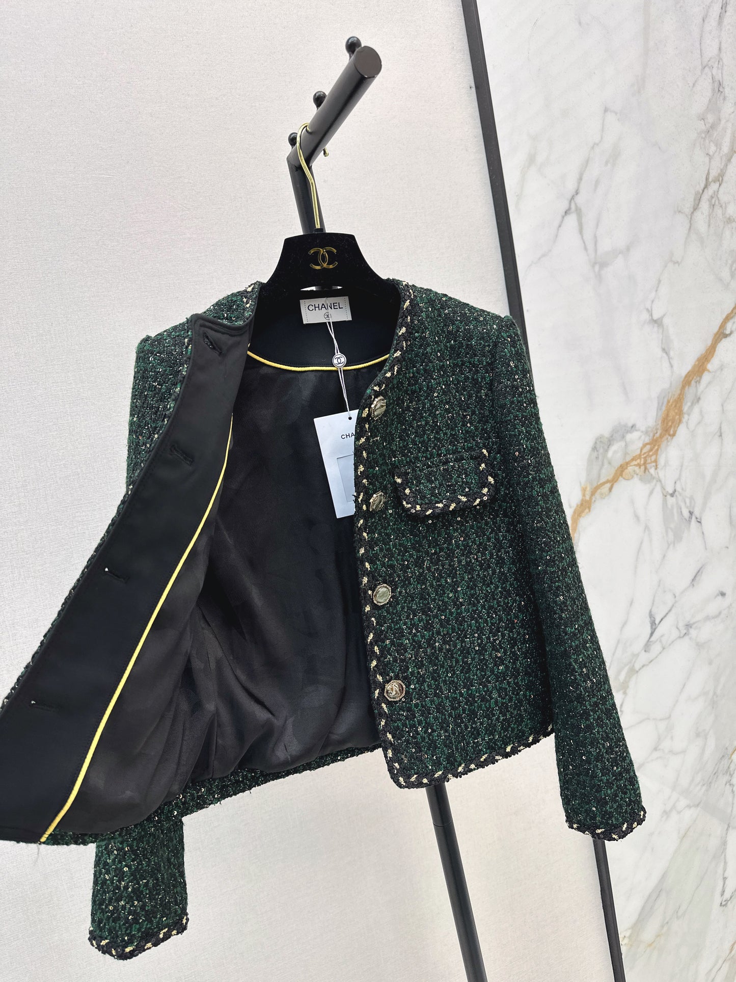 C 25 Trimmed tweed jacket