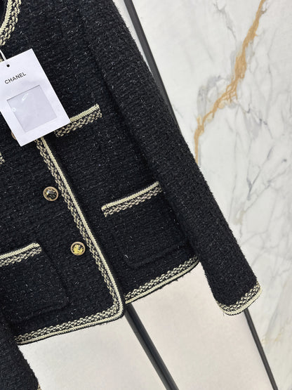 C 25 Trimmed tweed jacket