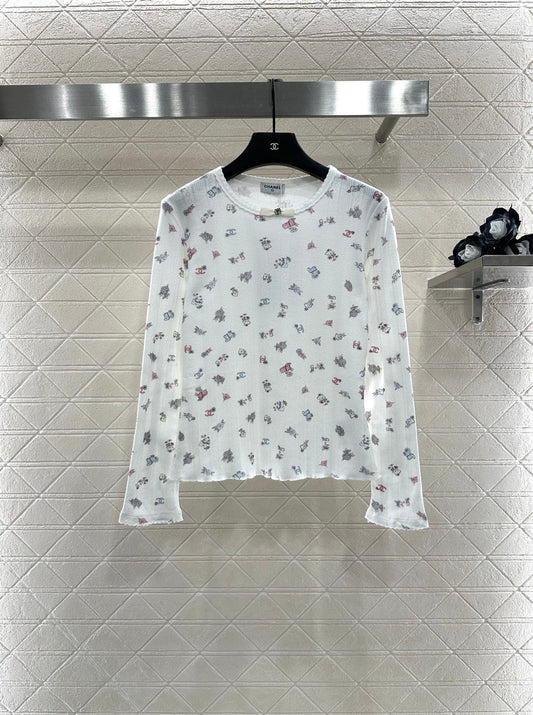 C 25 Printed bow decoration long sleeves
