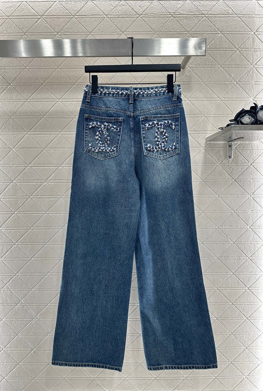 C 25 High-waisted bleached pleated denim trousers