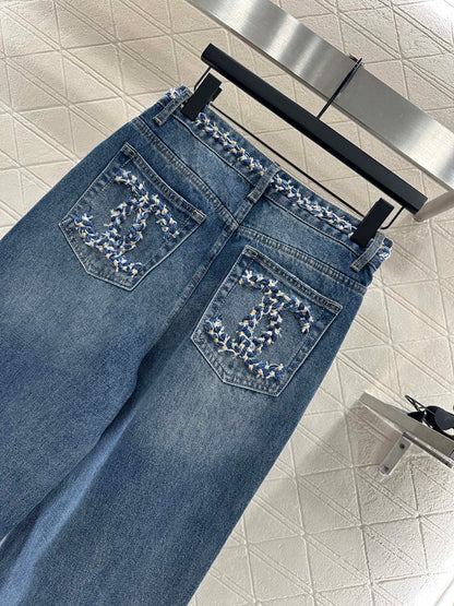 C 25 High-waisted bleached pleated denim trousers