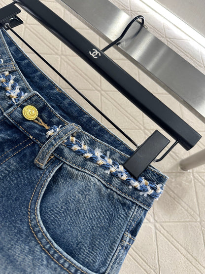 C 25 High-waisted bleached pleated denim trousers