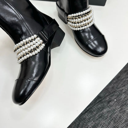 C 25 New sheepskin boots (suede/shiny black)