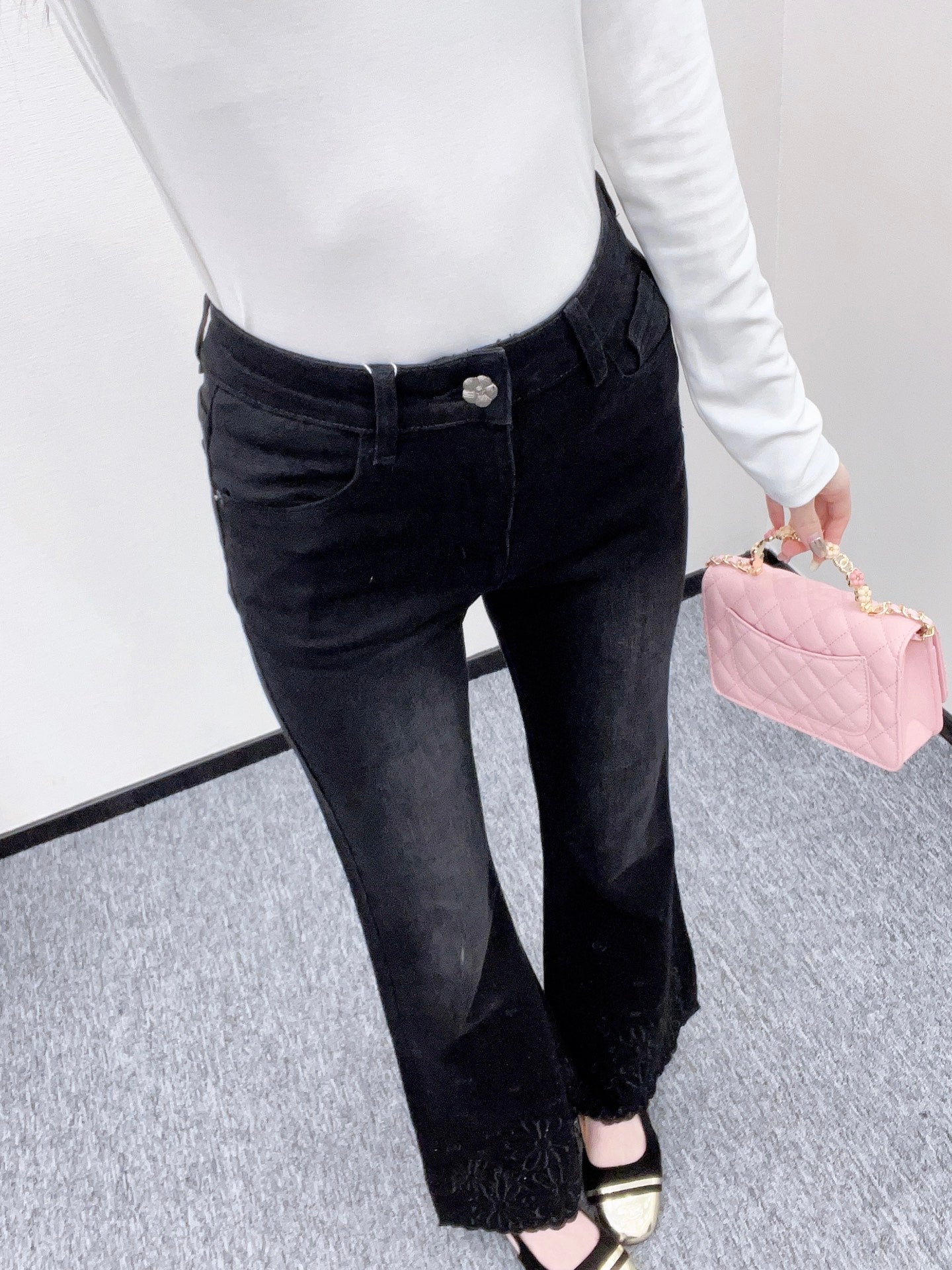 C 25 Diamond-studded high-waisted slim-fitting raw-edge flared jeans