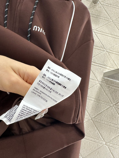 Mi 25 Hooded jacket and short skirt set