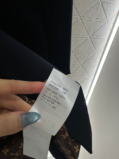 L 25 Round-neck leather chain-button midi coat