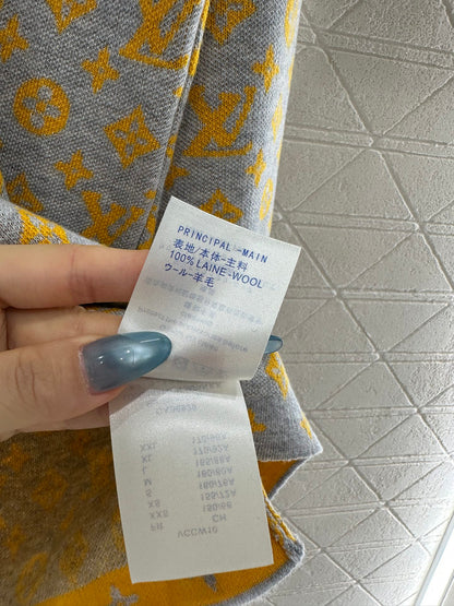 L 25 jacquard loose-knit wool top