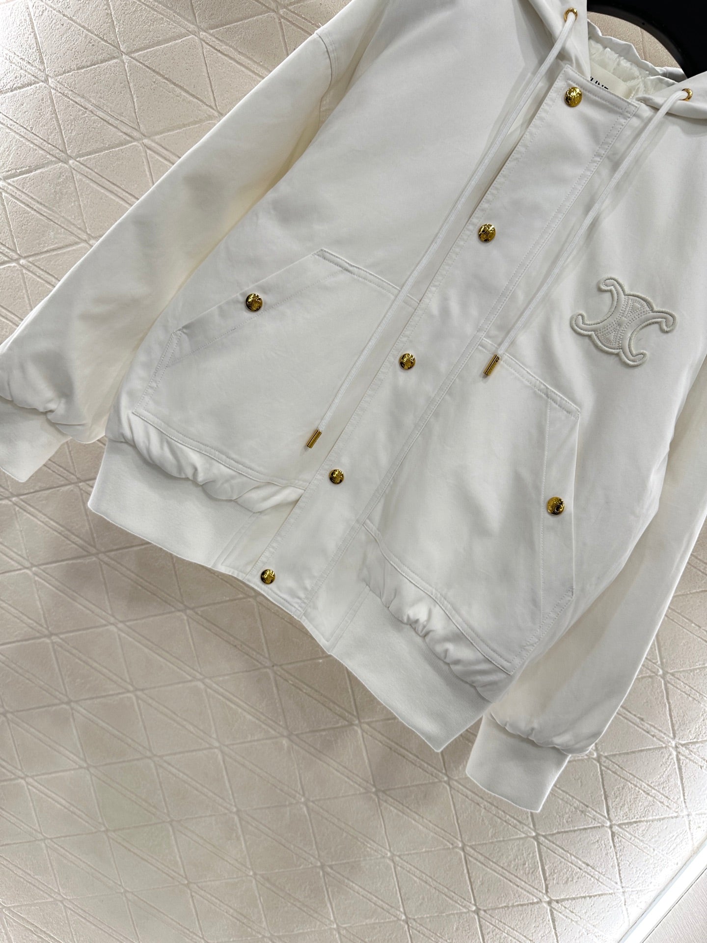 Ce 25 Hooded quilted drawstring jacket