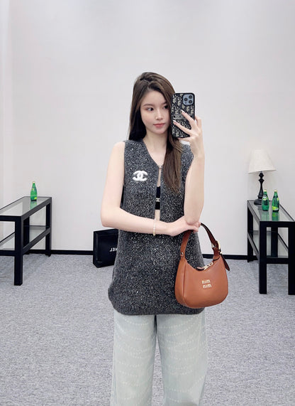 C 25 Silver knit vest