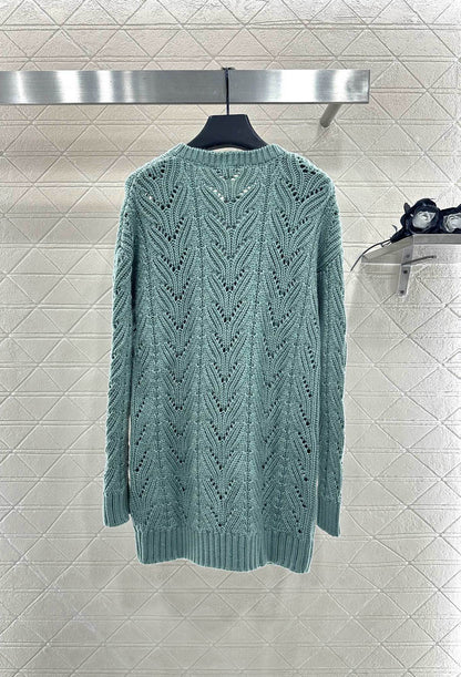 C 25 Bow-knitted wool skirt and sweater