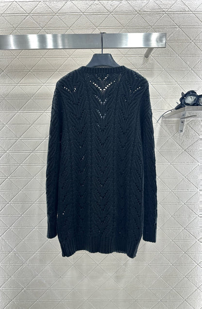 C 25 Bow-knitted wool skirt and sweater